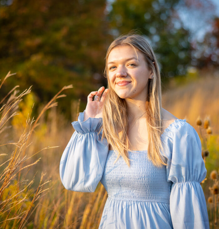 Full-service senior photographer in Carmel guiding a relaxed portrait session
