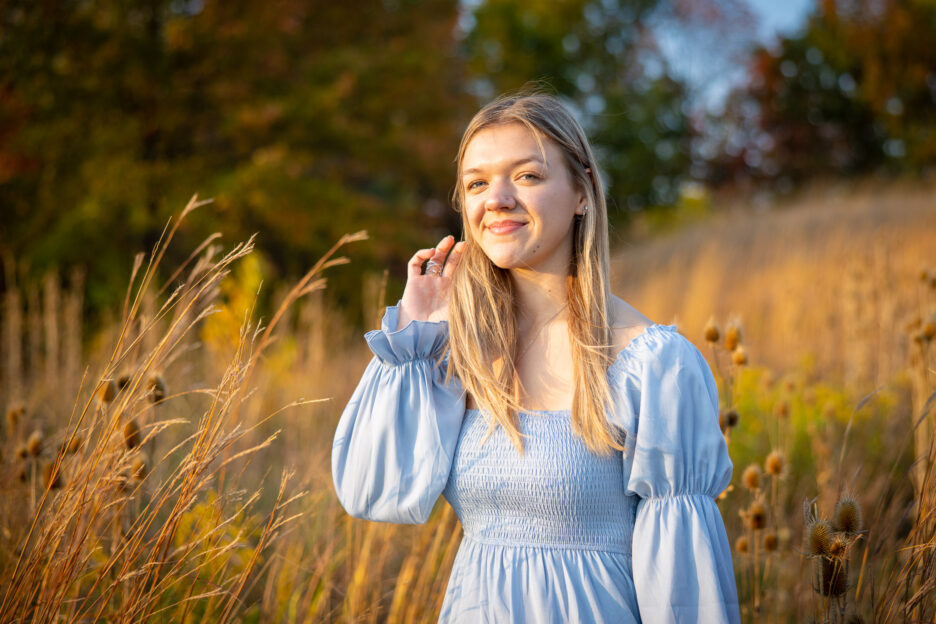 Full-service senior photographer in Carmel guiding a relaxed portrait session