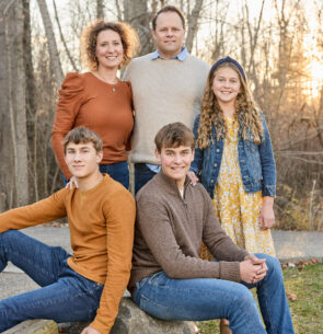 Family portrait in Carmel Indiana wearing coordinated neutral outfits