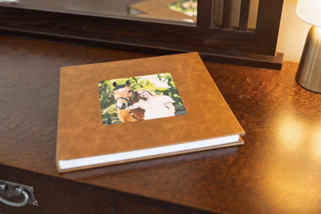 A senior portrait album displayed as a meaningful keepsake after graduation