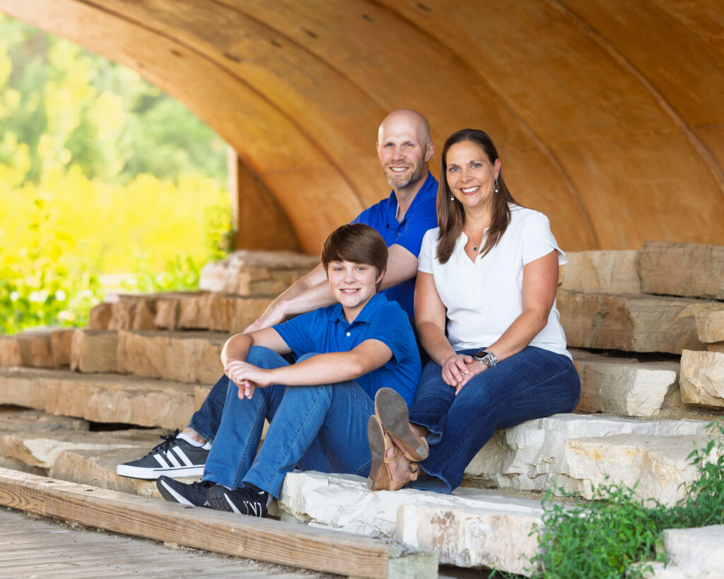 Family portrait with fresh spring greenery in Carmel Indiana